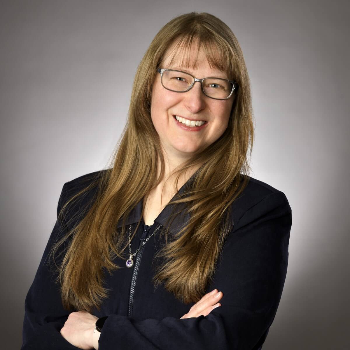 Adonica Sweet, professional headshot showing warm, approachable leadership presence